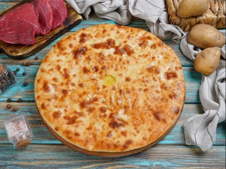 Осетинский пирог с мясом, грибами и картошкой Осетинский пирог с мясом, грибами и картошкой